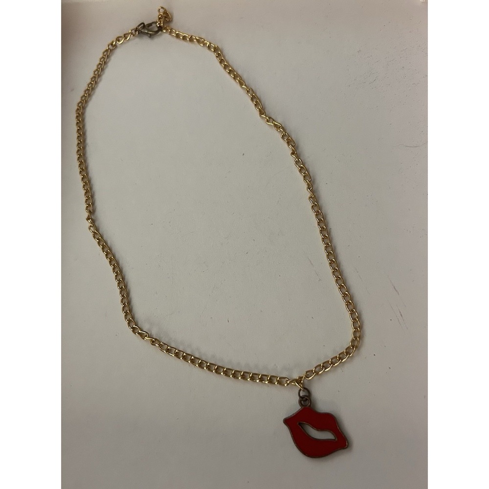 Golden Necklace With Red Lips Pendant